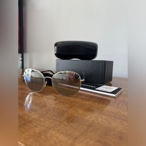 Authentic Chanel silver sunglasses with mirror frame